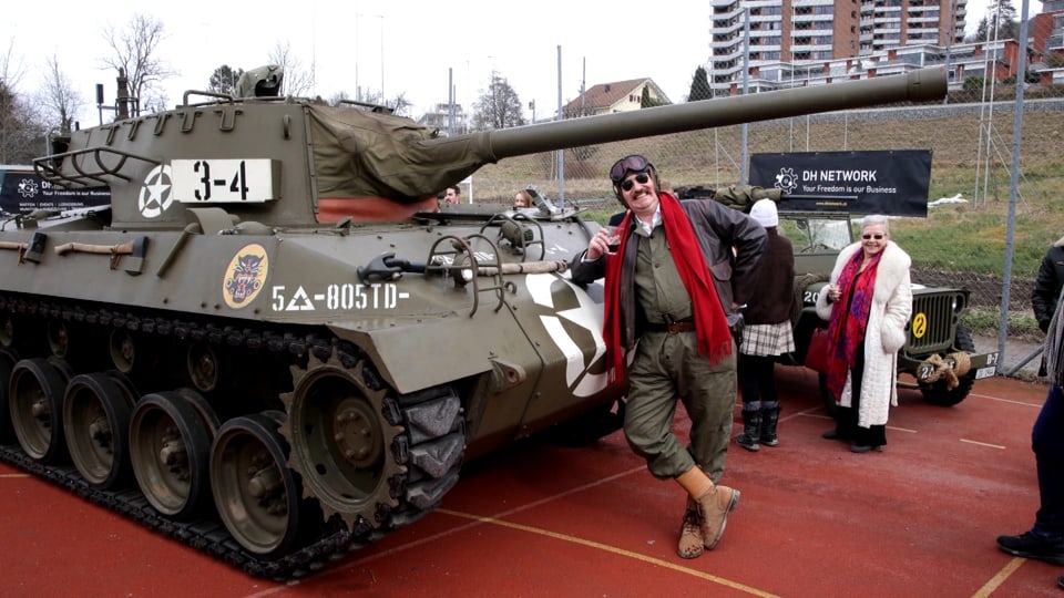 Niklas Nikolajsen poses in front of his tank
