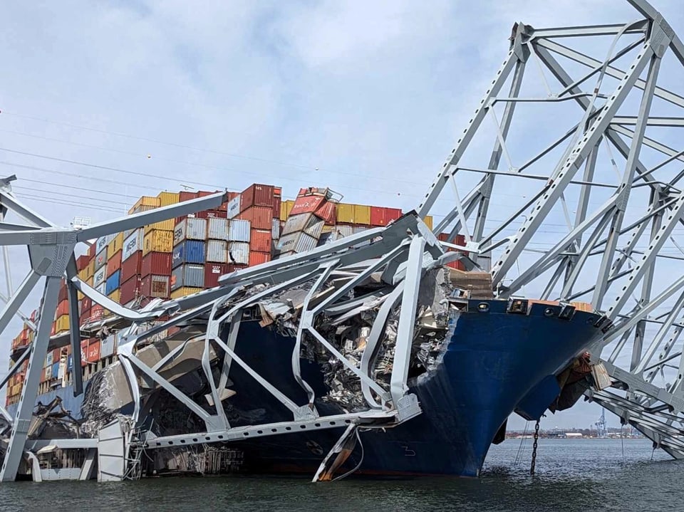 A container ship rams one of the supports of a highway bridge in the US state of Maryland. 