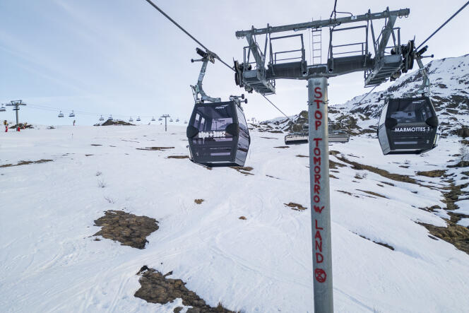 A pylon of a ski lift in Alpe-d'Huez, tagged to denounce the consequences of the Tomorrowland festival on the environment, on February 18. 