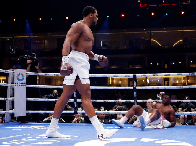 Francis Ngannou knocked down by Anthony Joshua, in Riyadh, March 9, 2024.