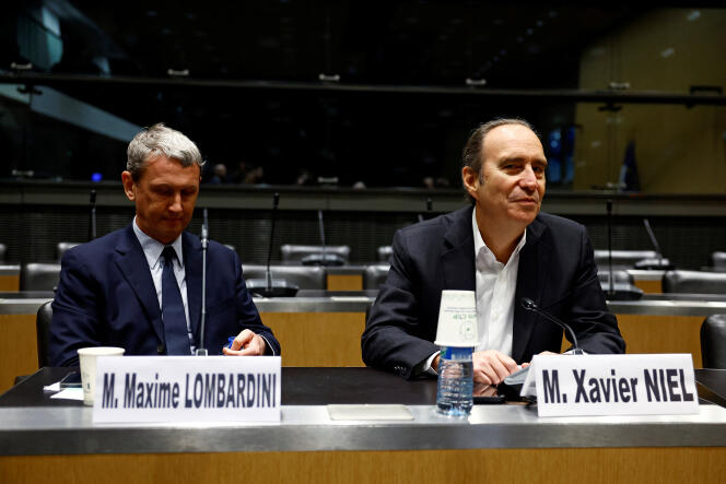 The vice-president of NJJ Médias, Maxime Lombardini, and the president of Iliad, Xavier Niel, before the Parliament's commission of inquiry into the allocation, content and control of authorizations for national television services on DTT, at the National Assembly, March 21, 2024.