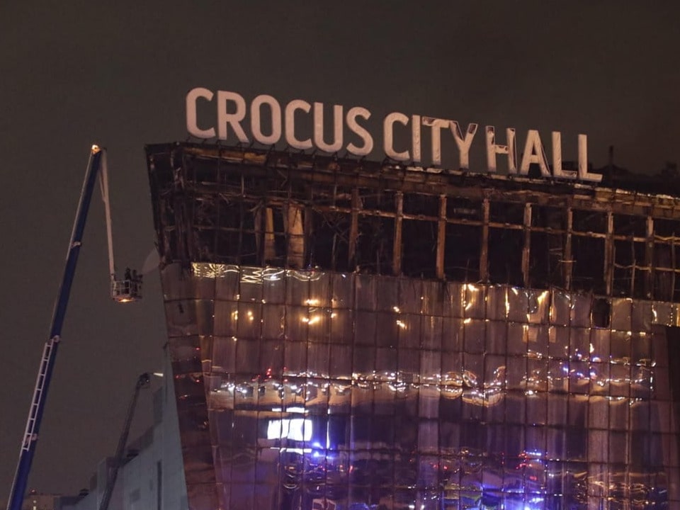 View of destroyed building with “Crocus City Hall” lettering