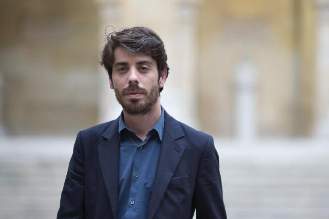 French publisher and writer Adrien Bosc poses after winning the Grand Prix de l'Académie française for his novel 