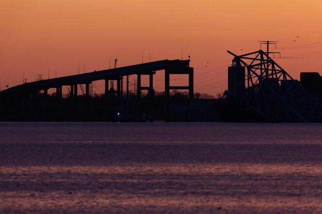 Sunset over the collapsed Francis Scott Key Bridge in Baltimore, Maryland, March 28, 2024.
