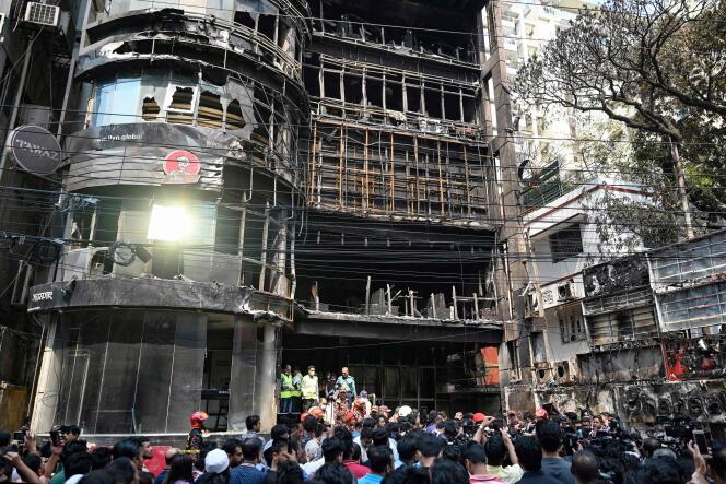 The day after a fire, as firefighters and experts inspect the building in Dhaka, March 1, 2024.