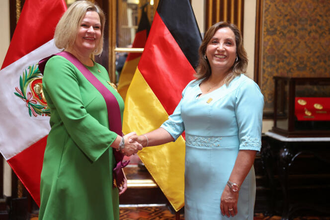 German Interior Minister Nancy Faeser shakes hands with Peruvian President Dina Boluarte (right), who wears a Rolex watch valued at $19,000 on her wrist, in Lima, February 27, 2024.