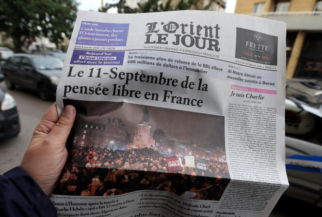 The front page of the French-speaking Lebanese newspaper “L'Orient-Le Jour”, in a street in Beirut, January 8, 2015.