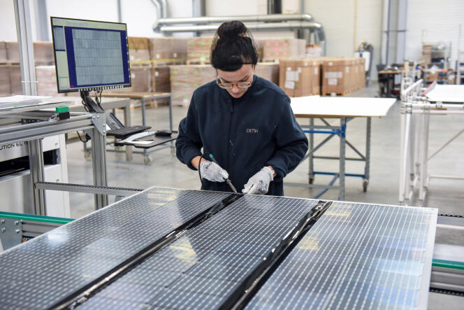 A Systovi employee works on a solar panel production line, at the Carquefou factory (Loire-Atlantique), March 6, 2023.   