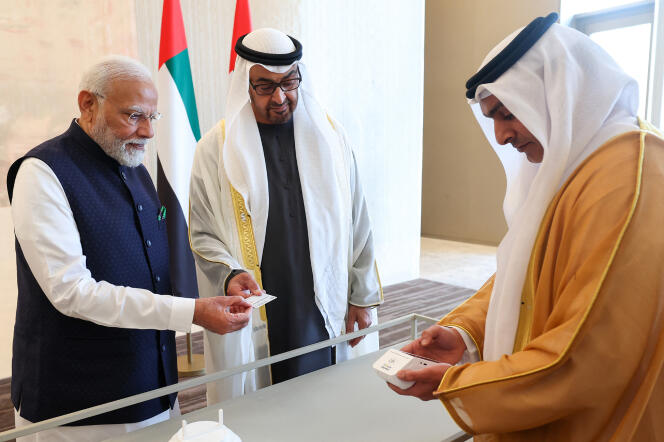 Indian Prime Minister Narendra Modi (left) and UAE President Sheikh Mohammed bin Zayed Al Nahyan (centre) during the launch of the Unified Payments Interface payment service system in Abu Dhabi, United Arab Emirates United Arab Emirates, February 13, 2024. 