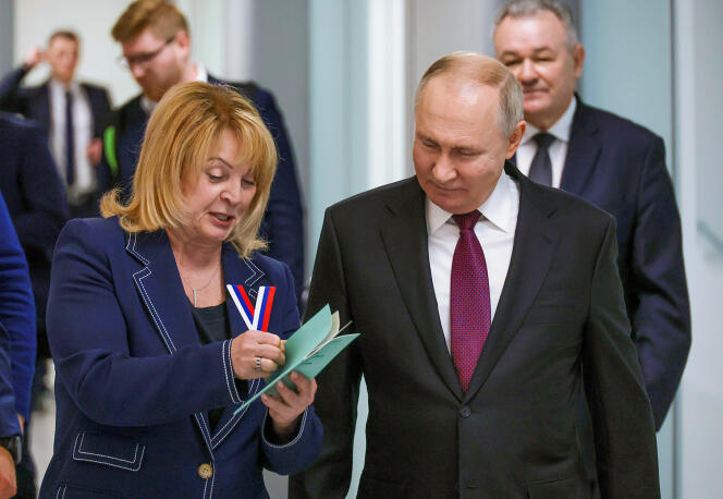 Ella Pamfilova and Vladimir Putin, in Moscow, December 18, 2023, during the submission of his candidacy for a fifth term.