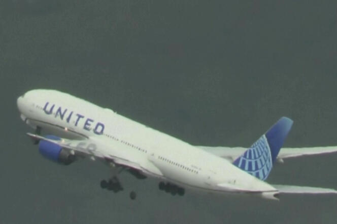 In this screenshot taken from a video, a United Airlines Boeing 777 loses a wheel just after takeoff from San Francisco International Airport on March 7, 2024.