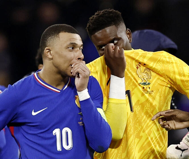 Kylian Mbappé and Brice Samba after the friendly match between France and Germany at the Groupama Stadium in Décines-Charpieu (Rhône), March 23, 2024.