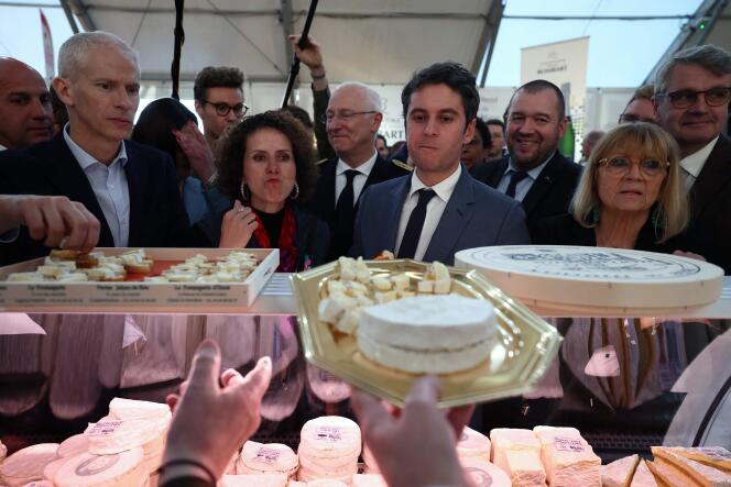 The Prime Minister, Gabriel Attal, and the Minister for Foreign Trade, Franck Riester (left), during their visit to the 55th edition of the Cheese and Wine Fair in Coulommiers (Seine-et-Marne), on 22 March 2024.