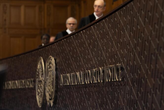 Judges of the International Court of Justice, the main judicial body of the United Nations, take their seats before the opening of historic hearings in The Hague, Monday February 19, 2024. 