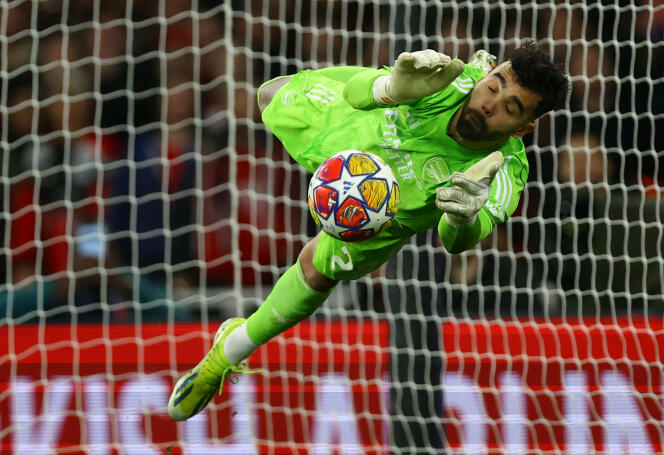 Arsenal goalkeeper David Raya blocks a shot on goal by FC Porto at the Emirates Stadium in London on March 12, 2024.