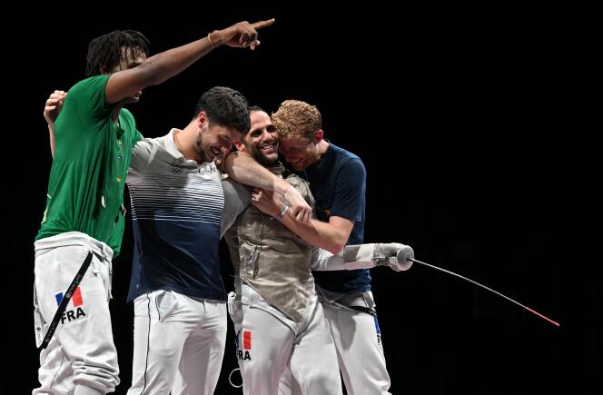 The French team – from left to right: Enzo Lefort, Maxime Pauty, Erwann Le Péchoux and Julien Mertine – during the fight for the gold medal in the men's team foil during the Tokyo Olympic Games, August 1, 2021.