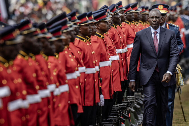 Kenyan President William Ruto reviews the guard of honor during independence celebrations in Nairobi on December 12, 2023.
