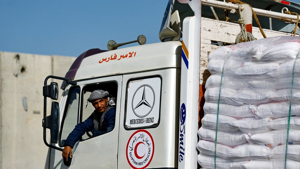 Aid trucks arrive from Egypt on their way to Gaza at the Kerem Shalom border crossing