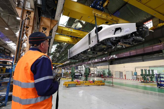 An employee works on SNCF's new generation TGV M (modular) at the Alstom factory in Belfort, eastern France, April 29, 2024. 