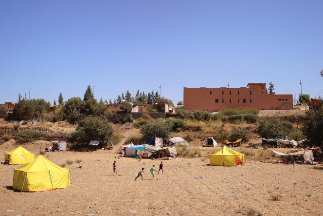 Children play after the deadly earthquake, in Amizmiz (Morocco), September 10, 2023.