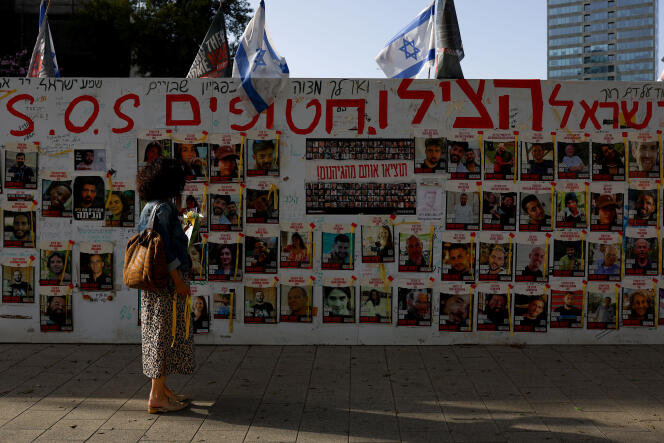 Photos of hostages held by Hamas, in Tel Aviv, April 5, 2024.