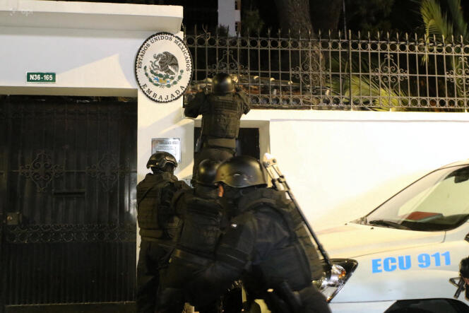 Ecuadorian police officers enter the Mexican embassy in Quito on April 5, 2024.