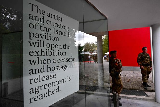 Italian soldiers stand guard in front of the Israeli pavilion at the Venice Biennale, April 16, 2024. 