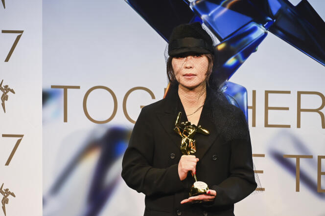Eiko Ishibashi, winning the Best Original Score award at the 17th Asian Film Awards, at the Xiqu Center in Hong Kong, March 10, 2024.