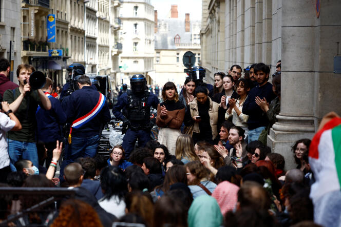 Students block the entrance to the Sorbonne, in Paris, April 29, 2024.
